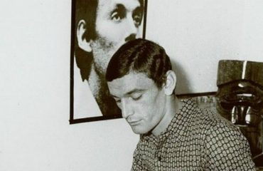 Gigi Riva e il poster di De Andrè