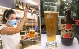 Photo session with a waitress with a face mask in a bar. New normality, security measures after the coronavirus pandemic, social distance, covid-19. Putting a glass with pole beer