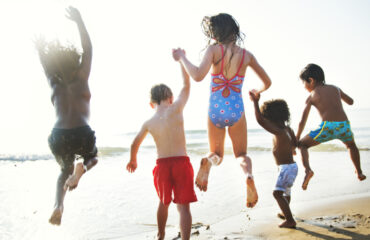 Children having fun on the beach